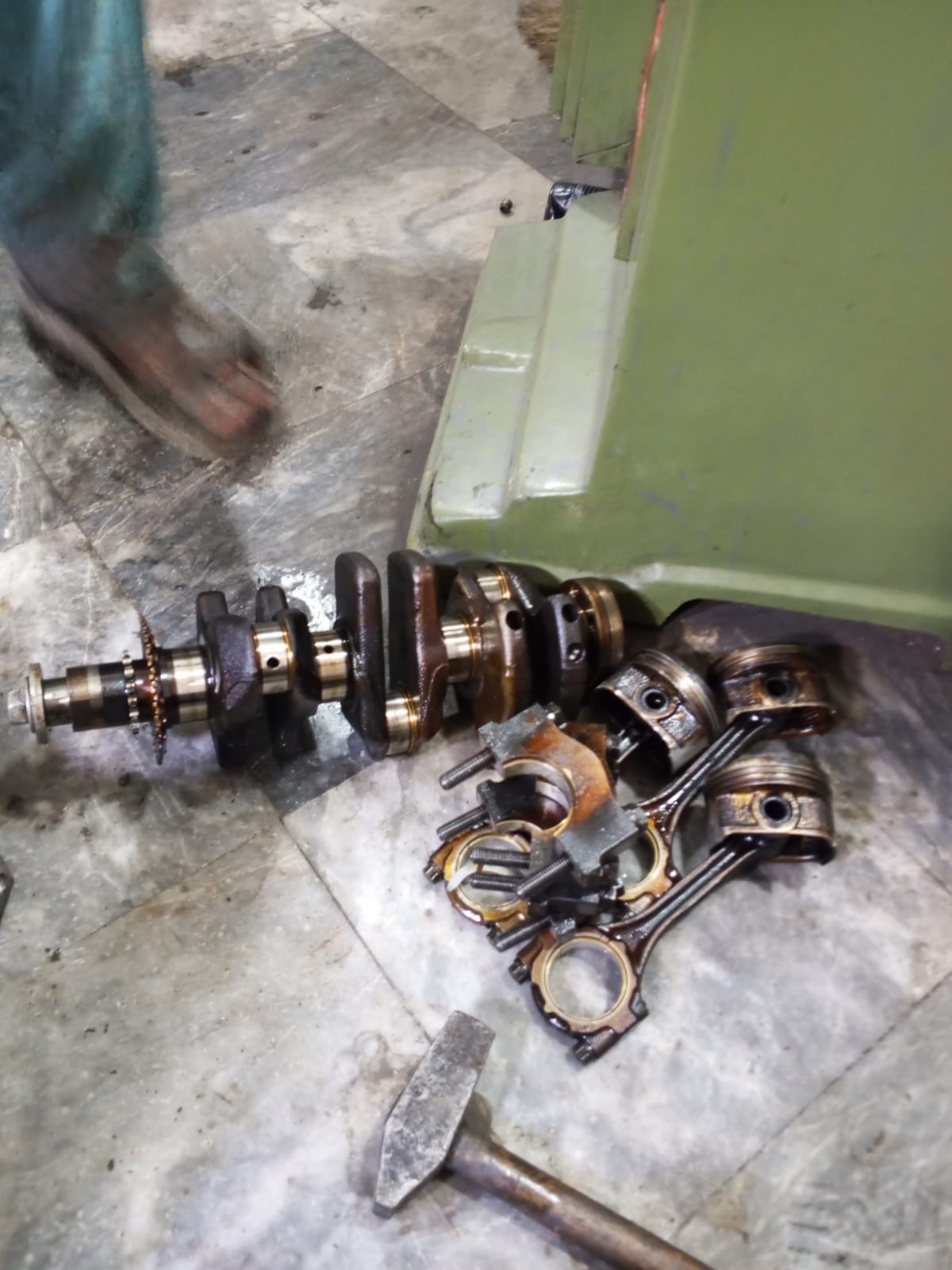Disassembled crankshaft, pistons and connecting rods logged
